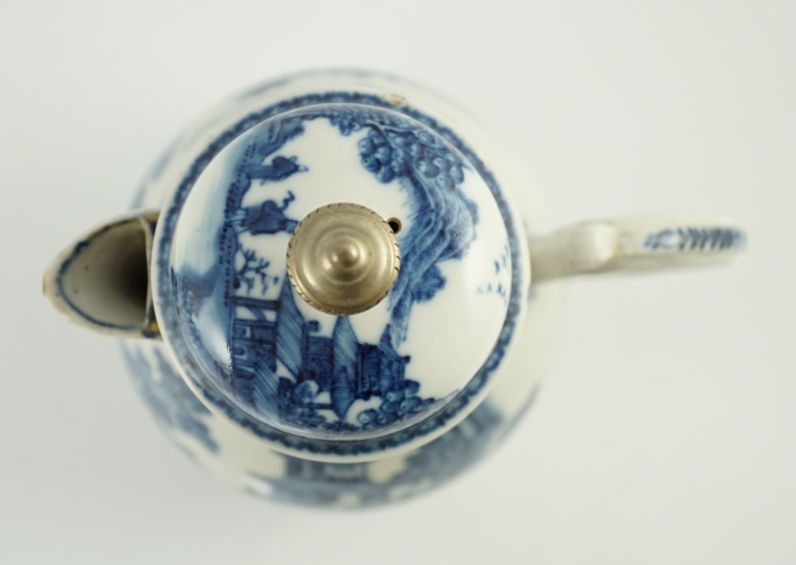 A Chinese blue and white jug and cover, Qianlong period, later metal finial